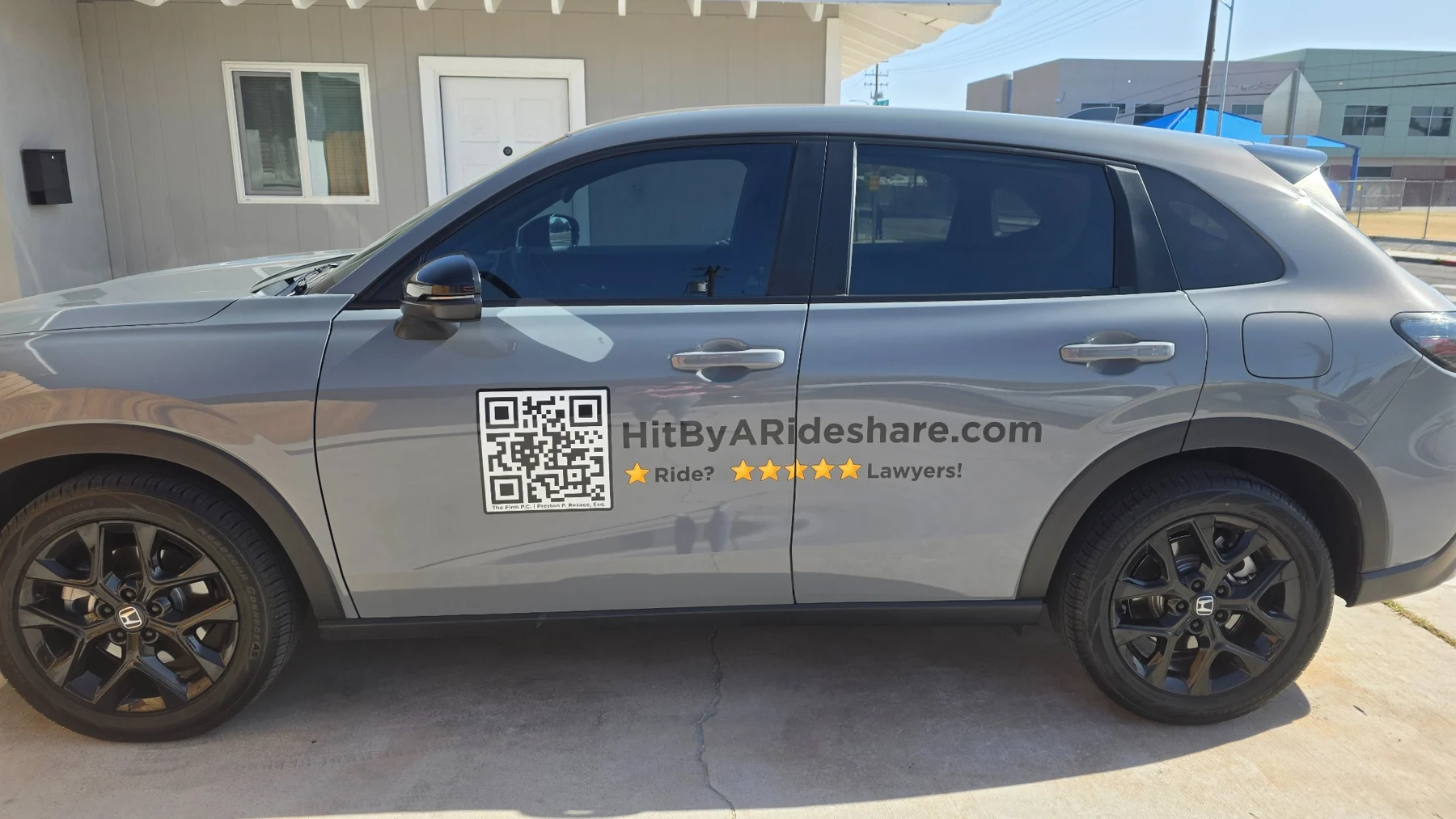 A HitByARideshare.com branded campaign vehicle